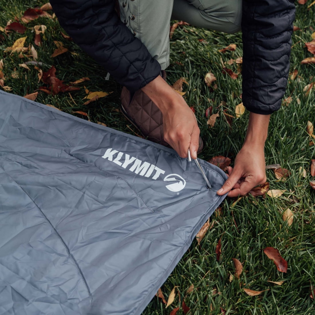thumbnail interactive-video image 1 of Klymit Horizon Packable Camping Blanket | PrimaLoft Insulation, Water-Resistant | 58" X 80" | Blue/Black 1 of 13